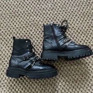 Black chain platform combat boots from Nasty Gal